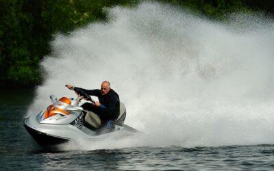 a man riding a jet ski