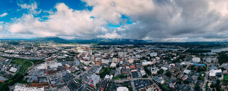 Panoramic aerial view capturing Chattanooga's vibrant skyline and surroundings.