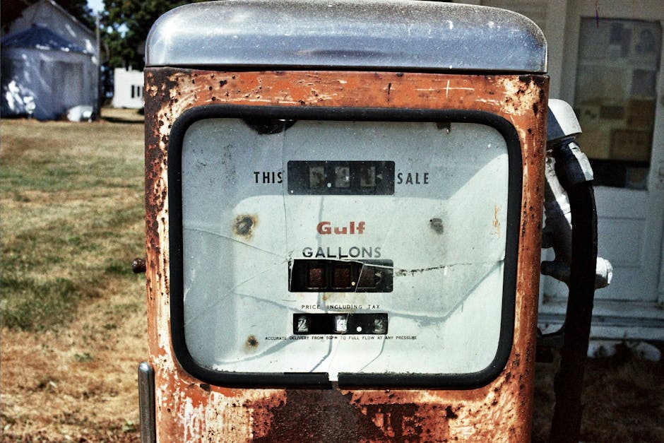 Rustic vintage gas pump at an old station in Waldo, Ohio, with nostalgic charm.