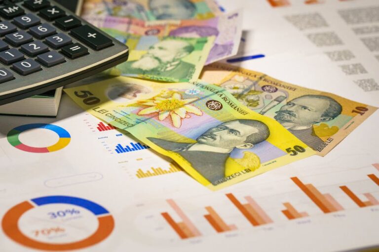 Romanian banknotes with graphs and calculator illustrating finance concepts.